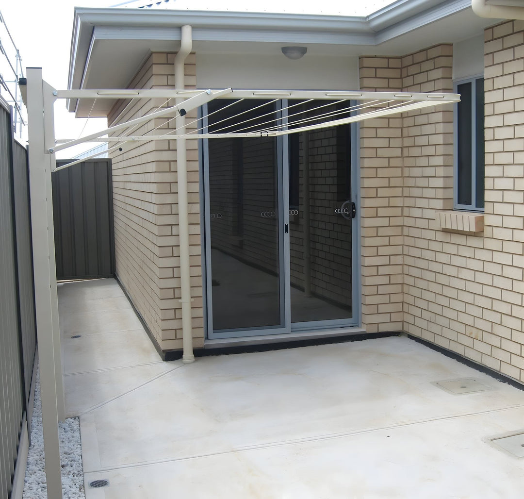 Austral standard 28 clothesline mounted on steel posts in classic cream