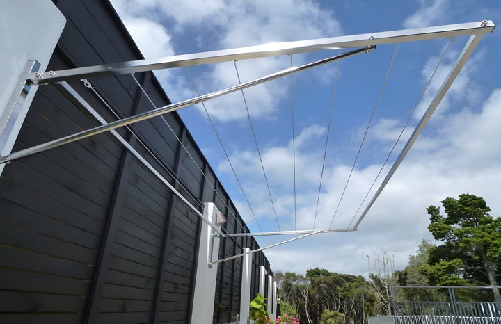 316 stainless steel clothesline wall mounted to fence with concrete posts