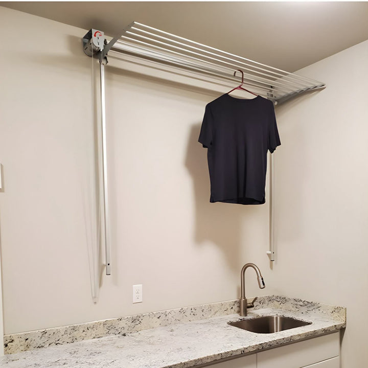 FoxyDry Wall installed in a laundry area or laundry room drying a shirt over a sink