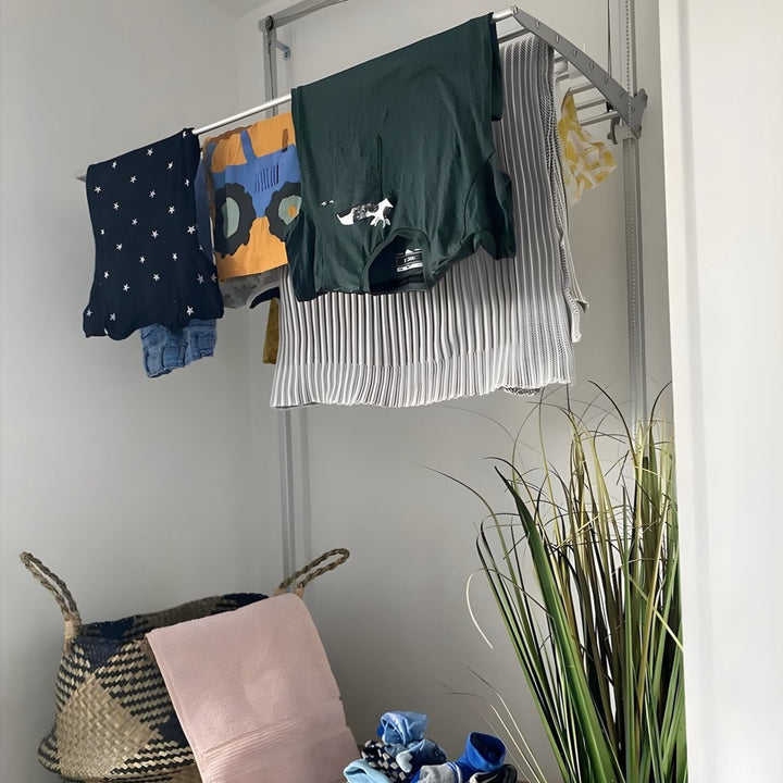 FoxyDry Wall installed indoors drying shirts and kids' clothes