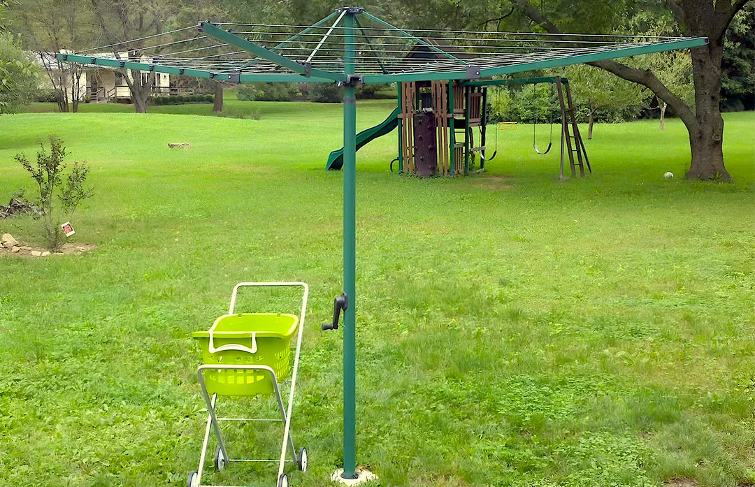 Hills Everyday Rotary 47 Clothesline - installed in big back yard with a laundry trolley by its side