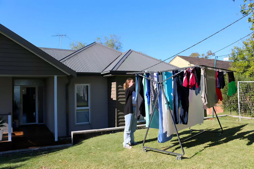 Sunchaser Mobile Clothesline used by a lady